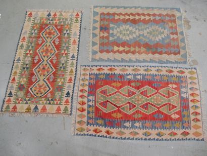 Set of 3 wool tribal rugs
186 x 107 cm (x2)...