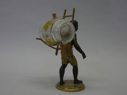 Portefaix en bronze à patine brune et dorée...
