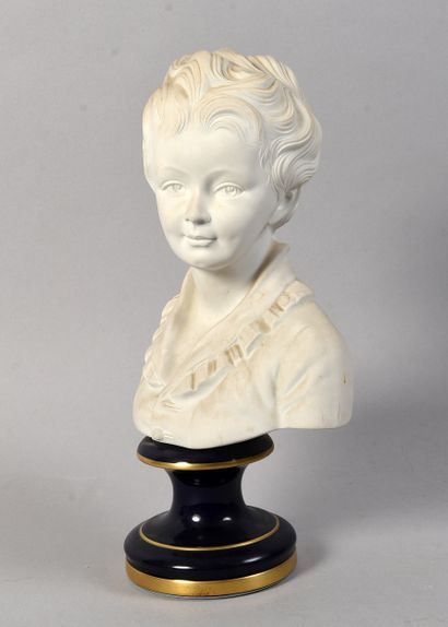 LIMOGES
Bisque bust of a young boy standing...