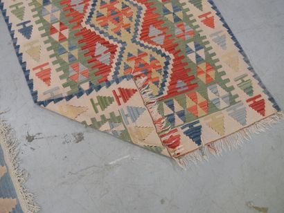 Set of 3 wool tribal rugs
186 x 107 cm (x2)...