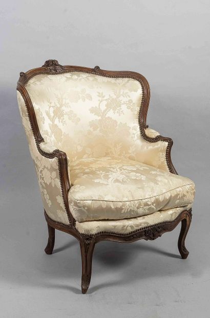 Large confessional-style cabriolet-back armchair...
