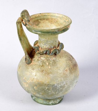 Large carafe with spherical body and ribboned...