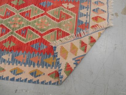 Set of 3 wool tribal rugs
186 x 107 cm (x2)...