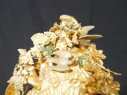* Giltwood clock in rocaille style decorated...
