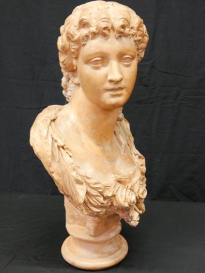 * Bust of a woman with a flowery bun on a...