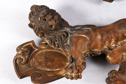 Two carved and polychromed wooden decorative...