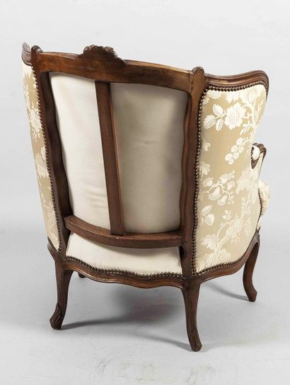 Large confessional-style cabriolet-back armchair...