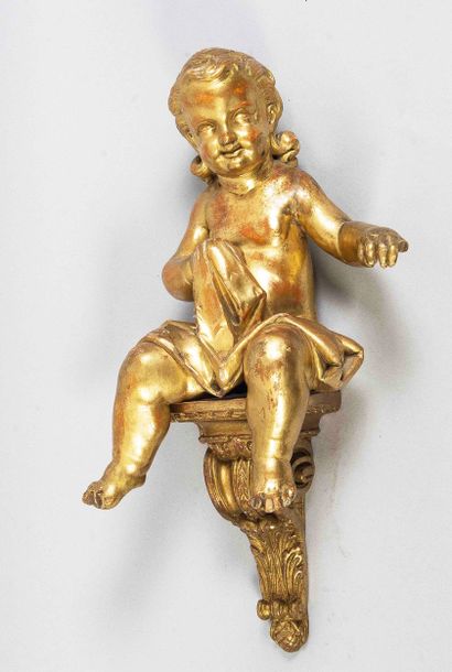 ITALIE, XIXe 
Putto en bois sculpté et doré,
haut...