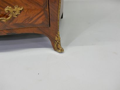 Rosewood veneered curved commode in violet...