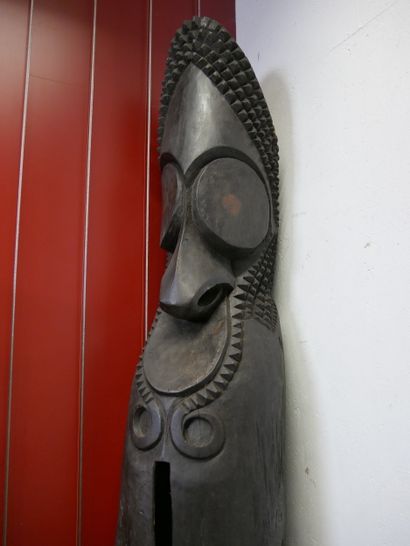 Large vertical slotted drum called 