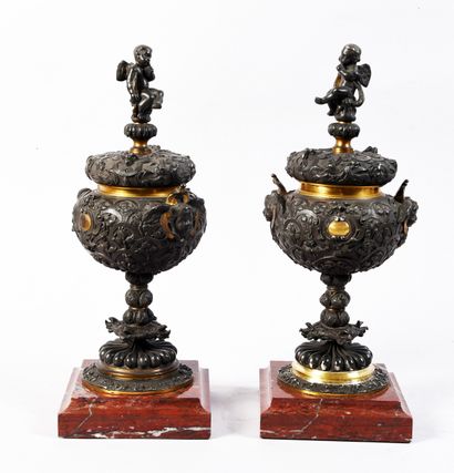 Pair of covered urns in the Barbedienne style...