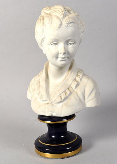 LIMOGES
Bisque bust of a young boy standing...