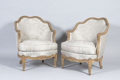 Pair of small bergères in molded and carved...