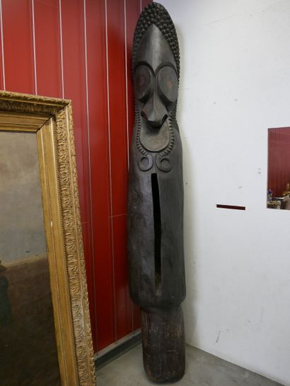 Large vertical slotted drum called 