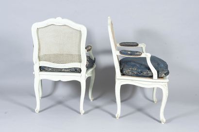 Pair of molded, carved and white rechampi...