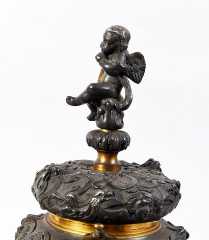 Pair of covered urns in the Barbedienne style...
