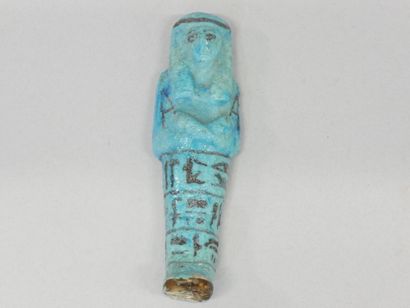 Two chaouabtis, one with a column painted...