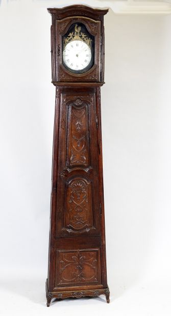 Horloge comtoise en bois sculpté à décor...