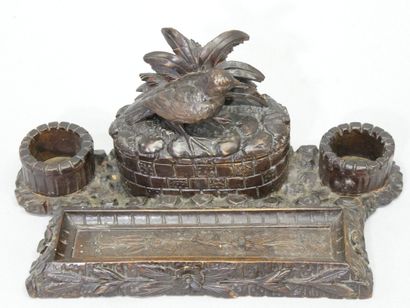 Carved wood inkwell with bird and well decoration....