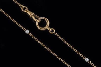 Long sautoir in yellow gold (750 thousandths)...