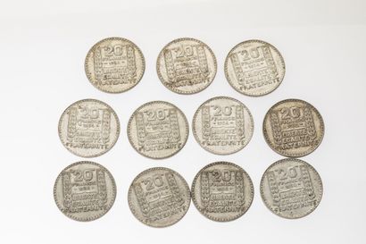 11 silver 20 franc coins, 10 from 1934 and...