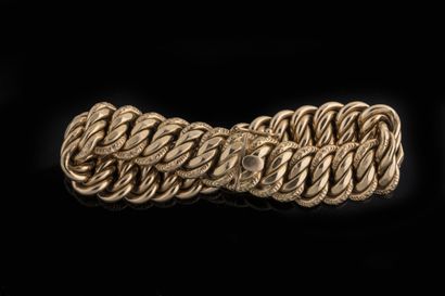 American curb chain bracelet in yellow gold...