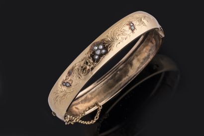 Bracelet jonc ouvrant en or jaune (750 millièmes)...