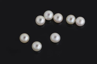 - 6 white cultured pearls with a piercing...