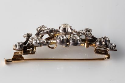 Silver (800 thousandths) and yellow gold...