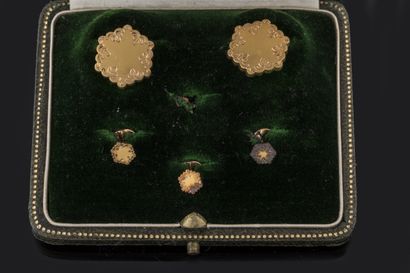 Two cufflinks and three collar buttons in...