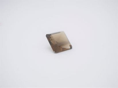 Large square faceted smoky quartz weighing...