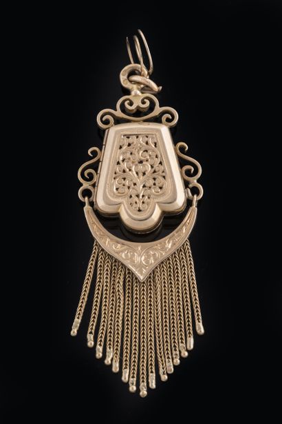 Yellow gold (750 thousandths) medallion pendant...