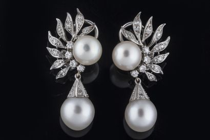 Pair of jewelry earrings decorated with foliage...