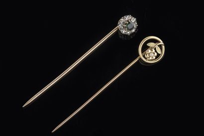 Two yellow gold (750 thousandths) and platinum...