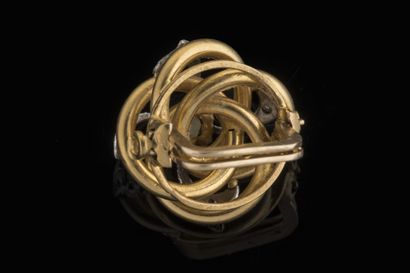 Two-tone (750 thousandths) yellow gold necklace...