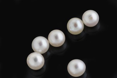 - 6 white cultured pearls with a piercing...