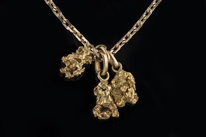3 nugget pendants in yellow gold (750 thousandths)....