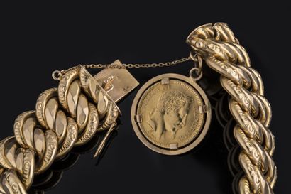 Large American link bracelet in yellow gold...