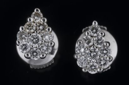 Pair of pear-shaped earrings paved with brilliant-cut...