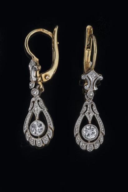 Pair of earrings supporting a drop-shaped...