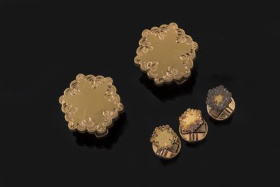 Two cufflinks and three collar buttons in...