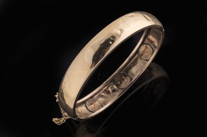 Bracelet jonc ouvrant en or jaune (750 millièmes)...
