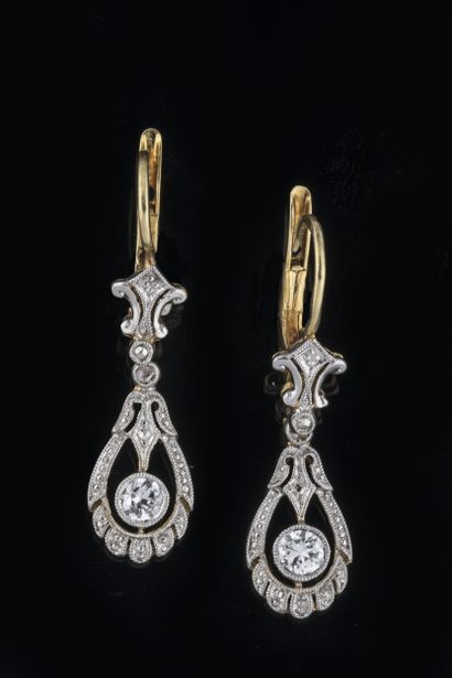 Pair of earrings supporting a drop-shaped...