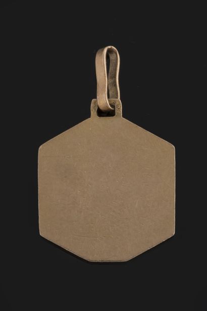 Médaille octogonale profil de vierge au voile...