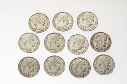 11 silver 20 franc coins, 10 from 1934 and...