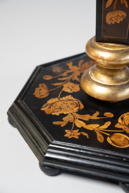 Octagonal tray torchiere in blackened wood...