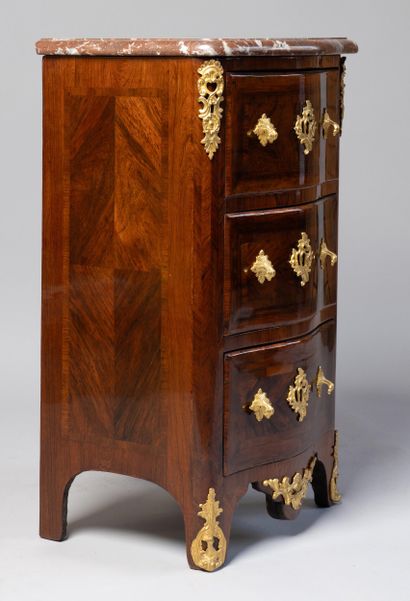 A rosewood veneered entre-deux chest of drawers...