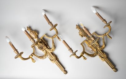 Suite de quatre appliques à trois bras de...