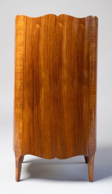 Rosewood veneer and stained wood fillets,...