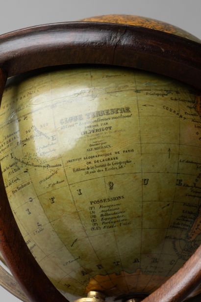 Globe 
In wood and papier-mâché, on a tripod...
